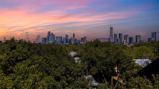 a view of a city with tall buildings