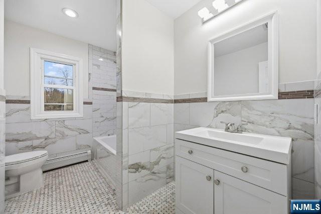 373 West Saddle River Road Upper Saddle River, NJ 07458 - Photo 17 of 31 a bathroom with a sink toilet and shower