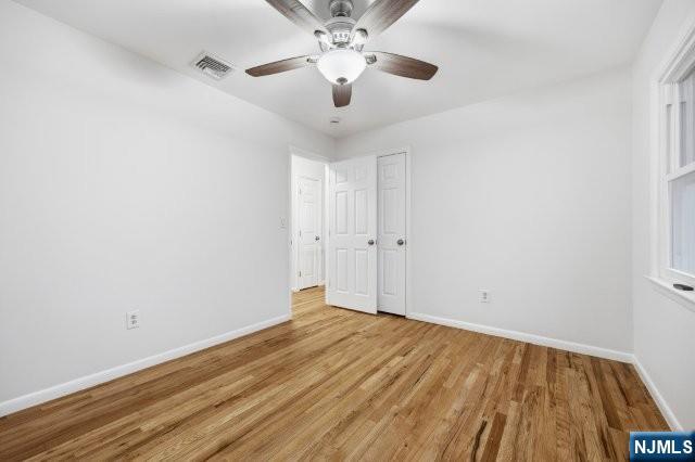 373 West Saddle River Road Upper Saddle River, NJ 07458 - Photo 20 of 31 a view of an empty room with wooden floor
