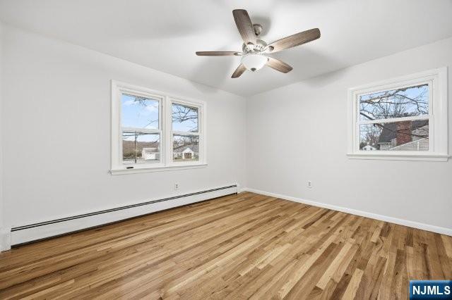 373 West Saddle River Road Upper Saddle River, NJ 07458 - Photo 21 of 31 a view of empty room with wooden floor