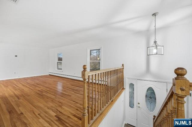 373 West Saddle River Road Upper Saddle River, NJ 07458 - Photo 8 of 31 a view of empty room with wooden floor