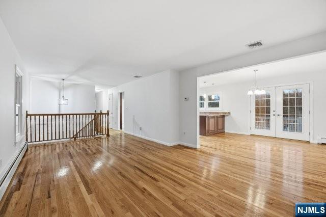 373 West Saddle River Road Upper Saddle River, NJ 07458 - Photo 10 of 31 a view of a room with wooden floor and windows