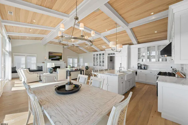 a view of a chairs and table in the balcony