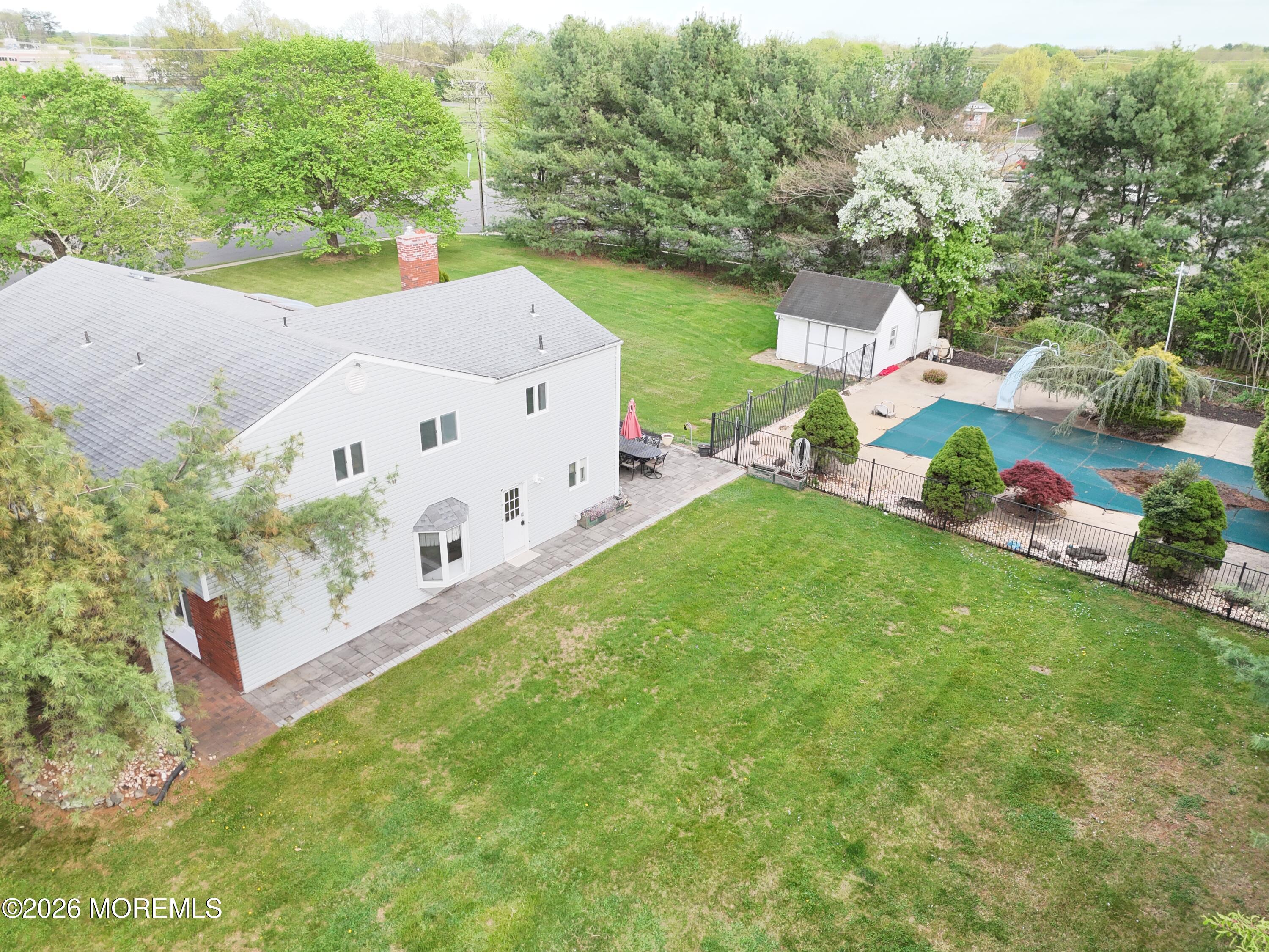 1 Flintlock Road Freehold, NJ 07728 - Photo 32 of 41 Right Side Closer View with Pool