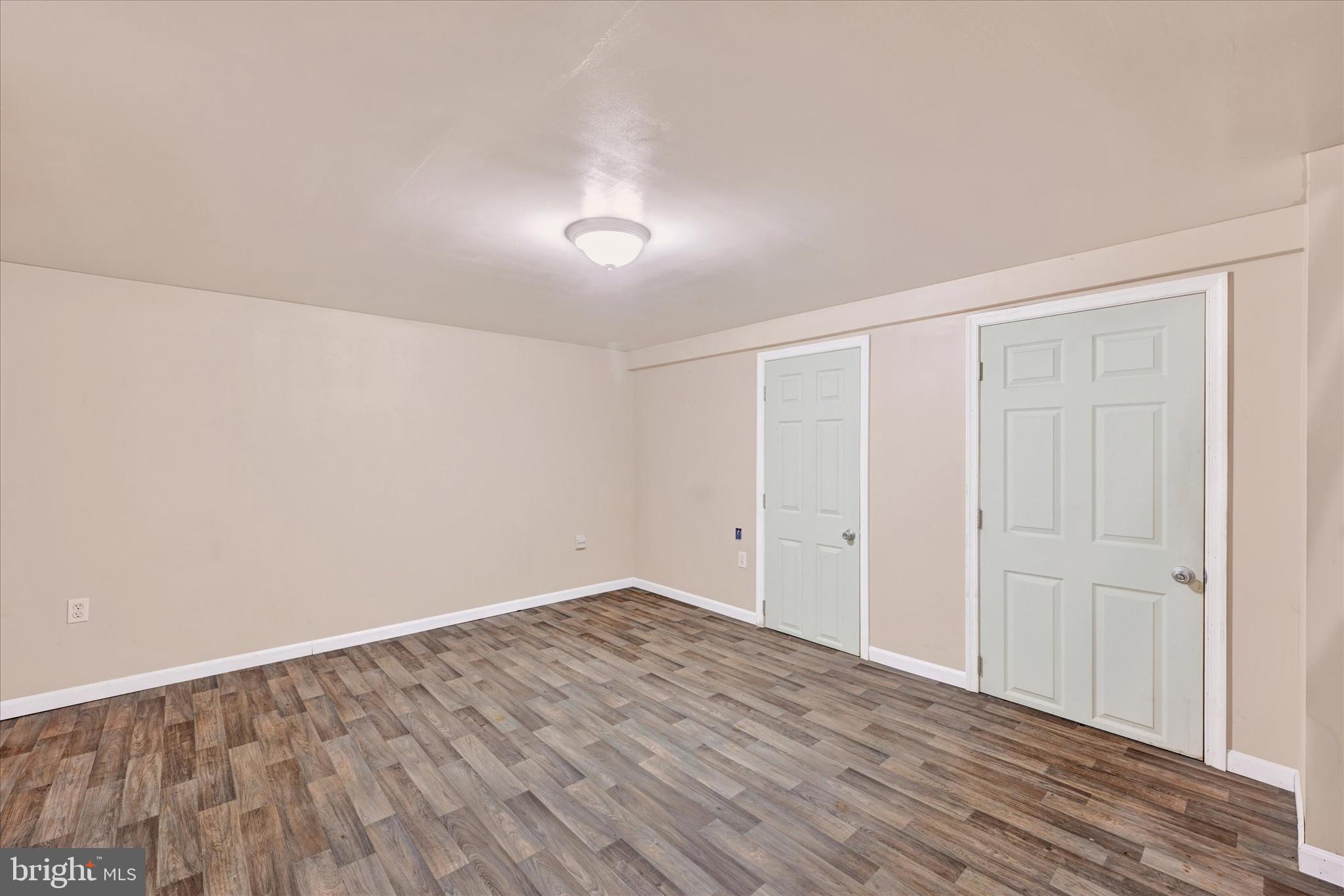 2013 Wareham Road Baltimore, MD 21222 - Photo 13 of 17 wooden floor in an empty room