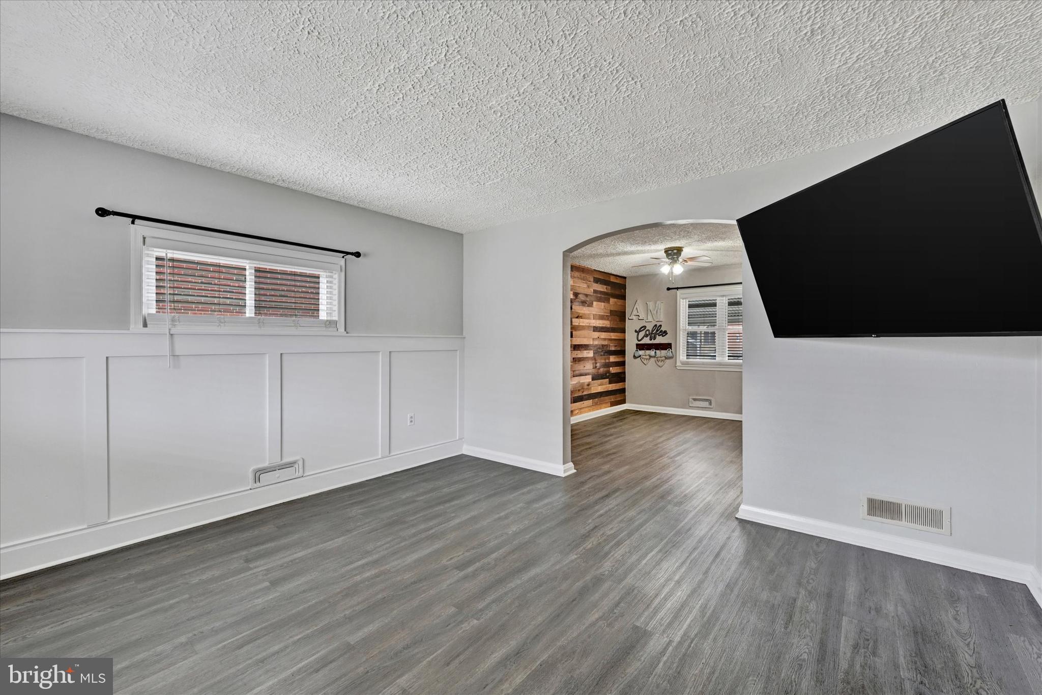 2013 Wareham Road Baltimore, MD 21222 - Photo 3 of 17 a view of a livingroom with wooden floor