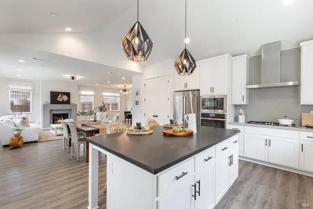 a kitchen with a counter space cabinets and appliances