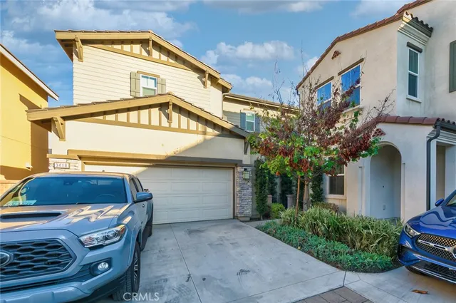 a view of a house with a garage