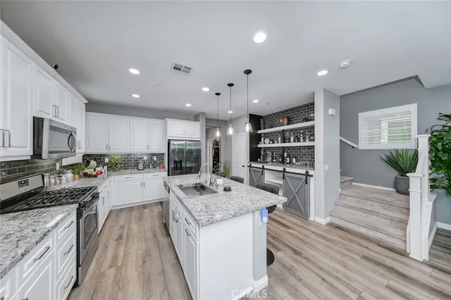a workspace with furniture and a book shelf