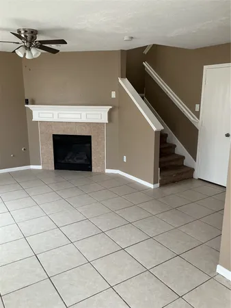 a living room with a fireplace