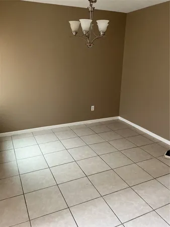 a view of a room with a fan