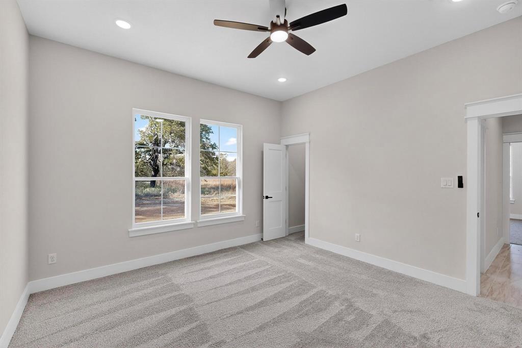 1161 Gonzollas Road Springtown, TX 76082 - Photo 28 of 40 a view of an empty room with a window