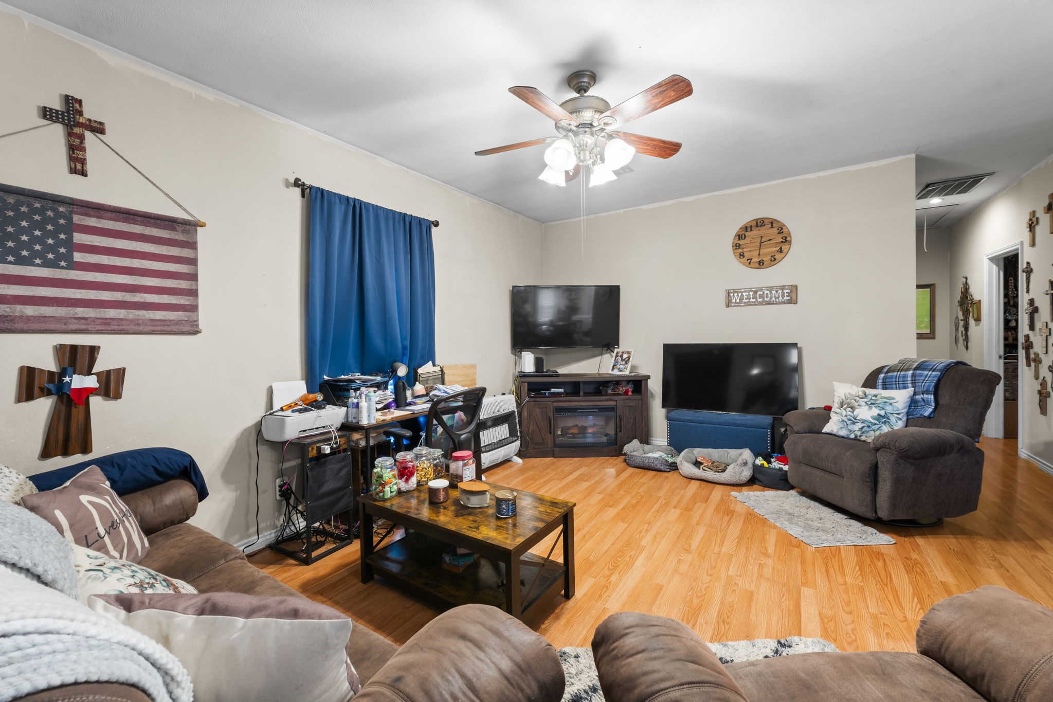14991 North Tram Road Splendora, TX 77372 - Photo 14 of 40 a living room with furniture kitchen view and a flat screen tv