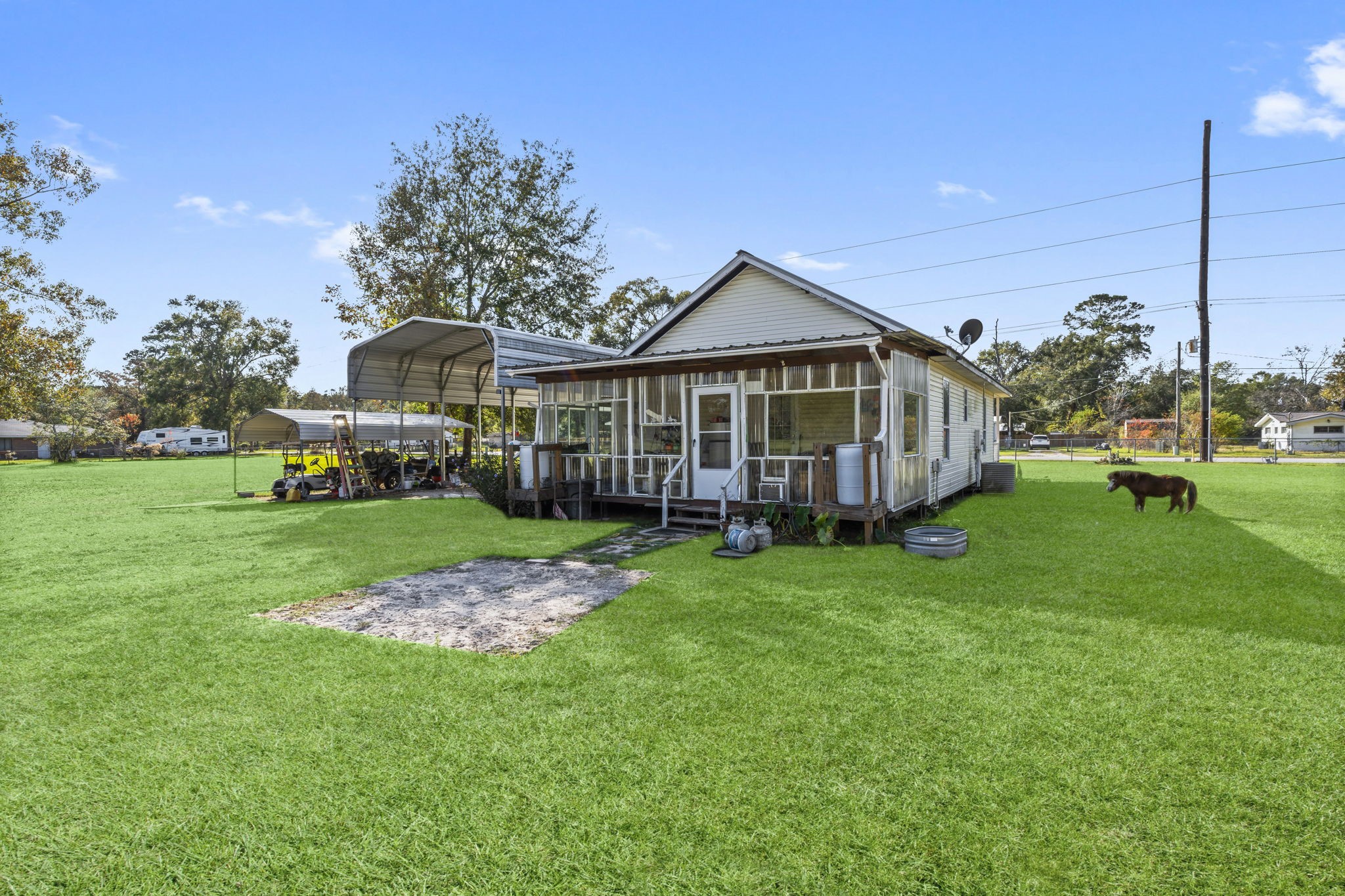 14991 North Tram Road Splendora, TX 77372 - Photo 25 of 40 a view of a house with a big yard