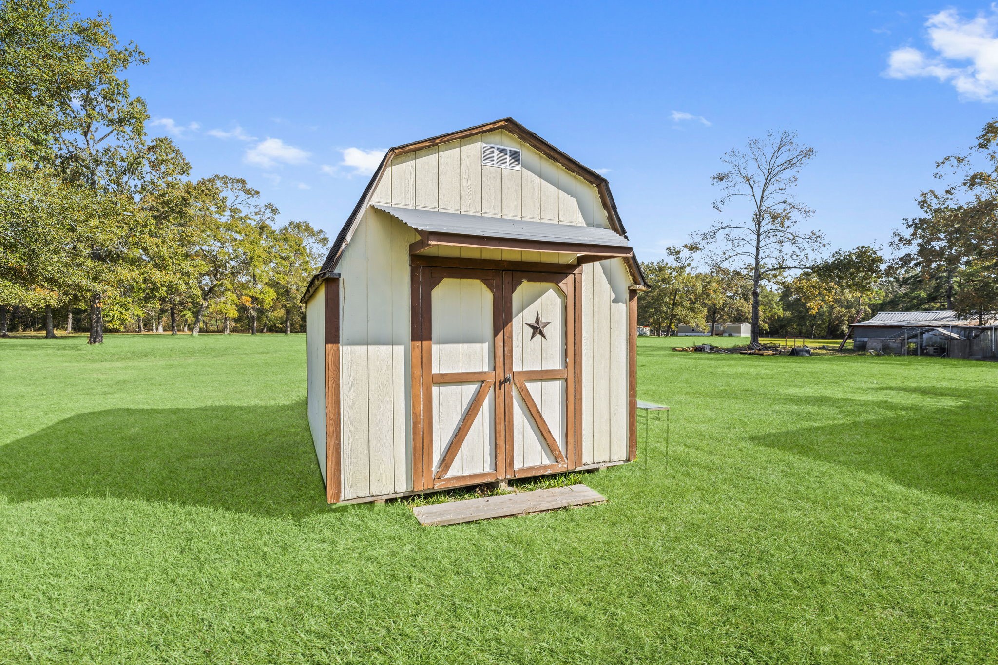 14991 North Tram Road Splendora, TX 77372 - Photo 26 of 40 a view of a tiny house with a park