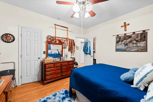 a living room with lots of furniture and a flat screen tv