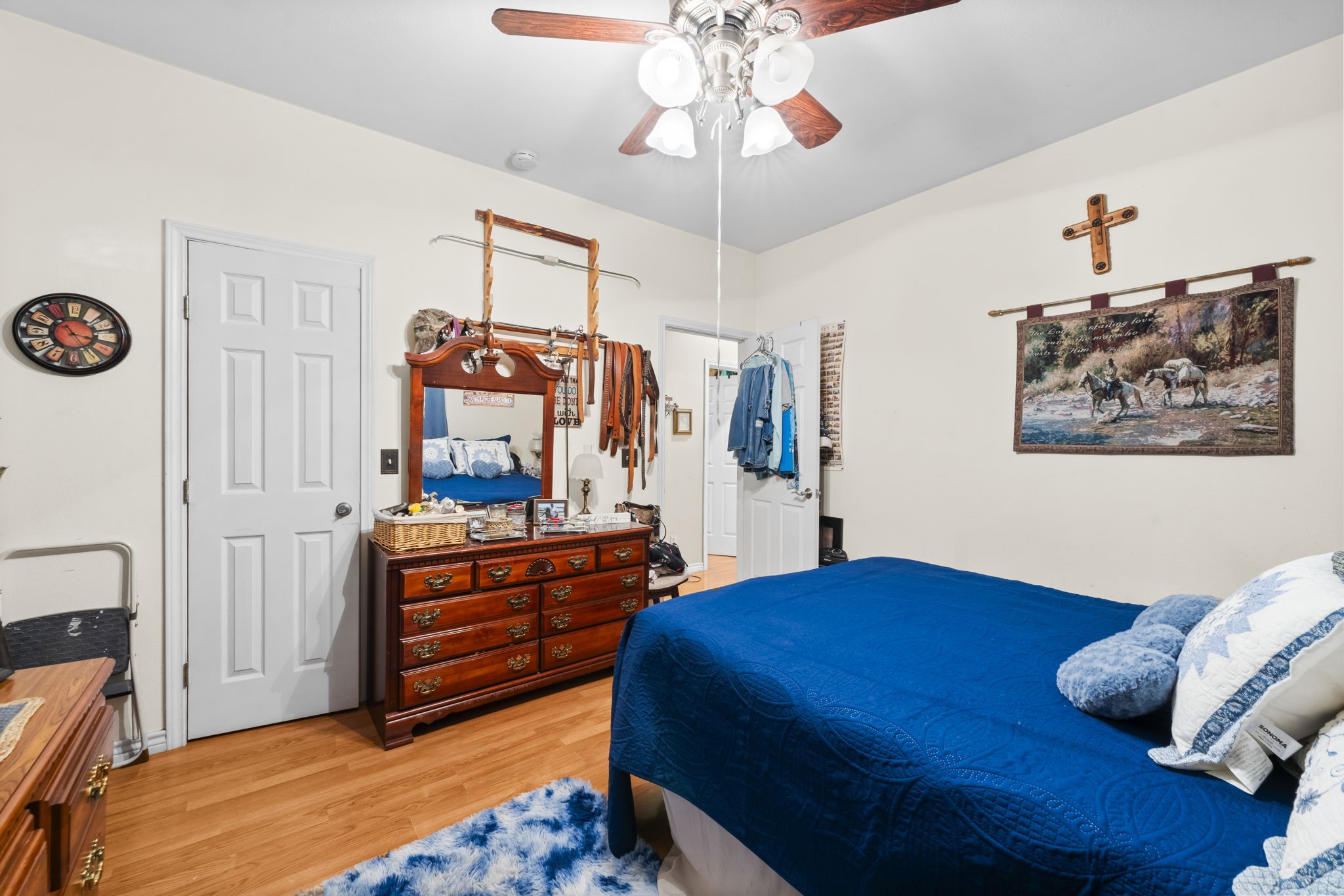 14991 North Tram Road Splendora, TX 77372 - Photo 8 of 40 a bedroom with a bed and wooden floor