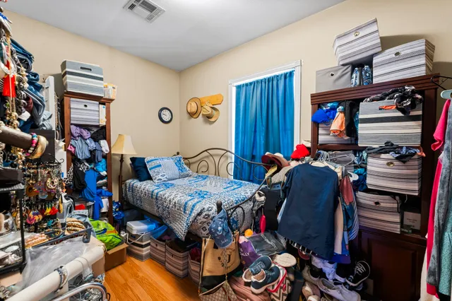 a bathroom with a sink vanity mirror and shower