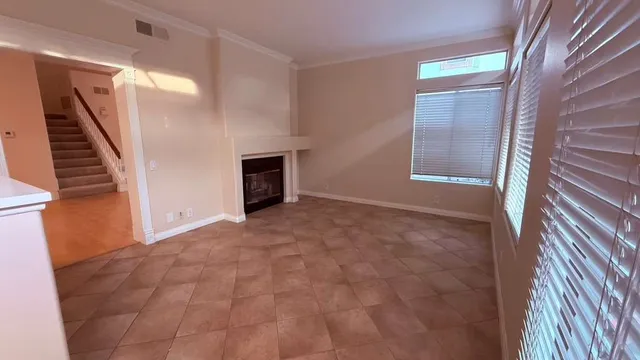 a view of a hallway with windows