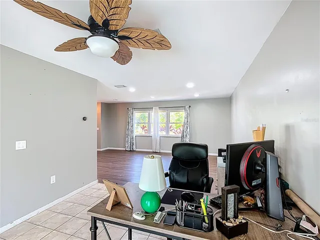 a workspace with furniture and window