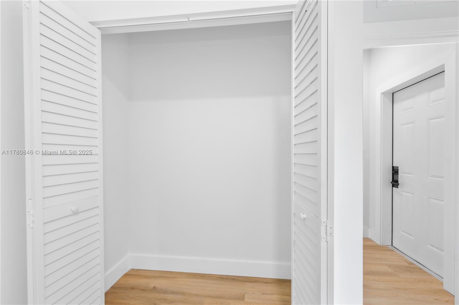 2121 Northwest 45th Street, Unit 2123 Miami, FL 33142 - Photo 11 of 24 a view of closet area