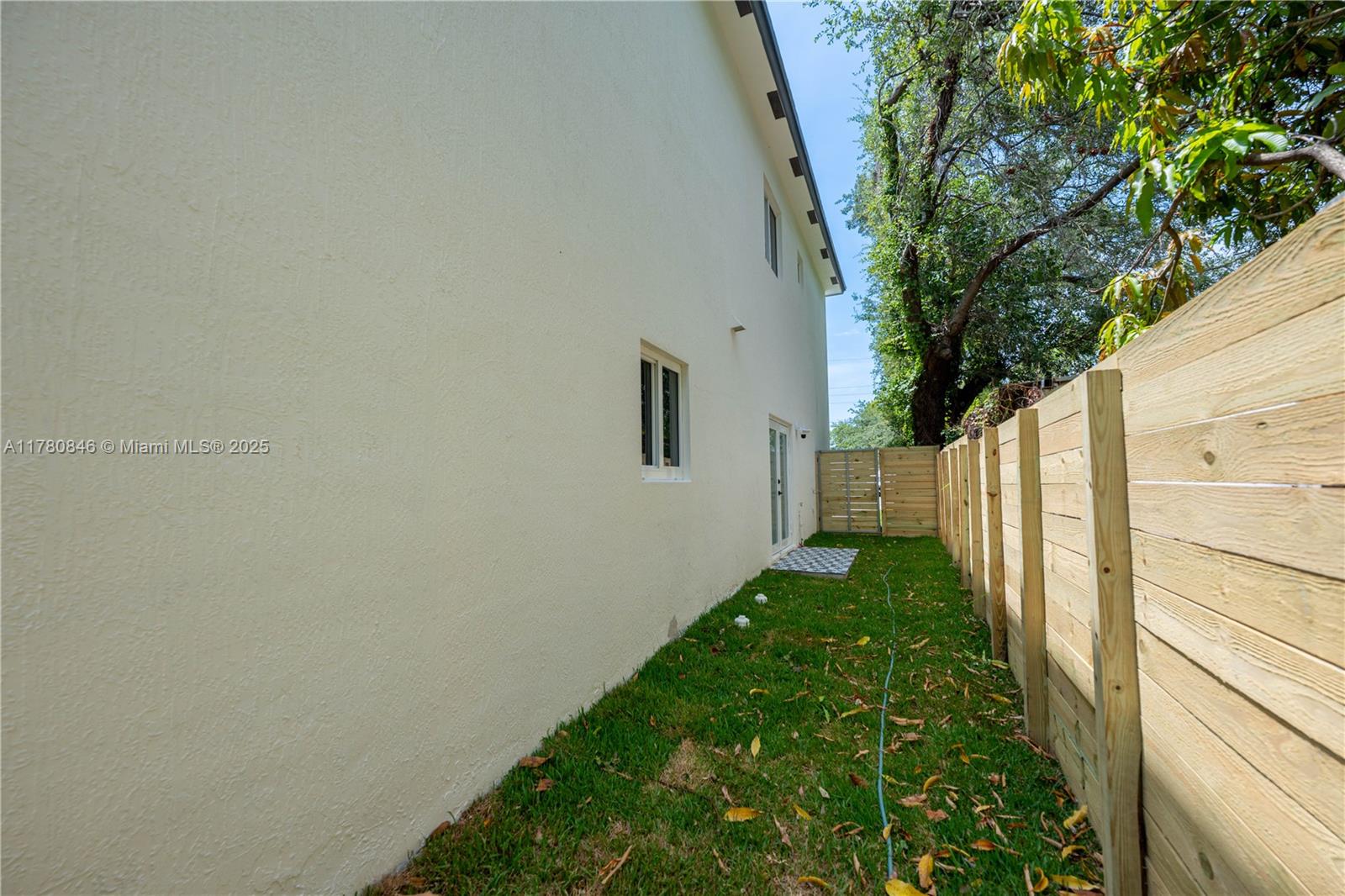 2121 Northwest 45th Street, Unit 2123 Miami, FL 33142 - Photo 22 of 24 a view of yard from a balcony