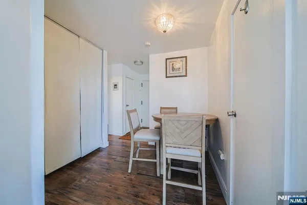 a view of a livingroom with furniture and wooden floor