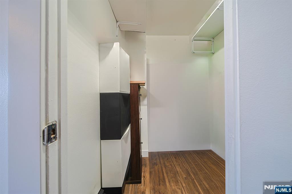 277 Prospect Avenue, Unit 4A Hackensack, NJ 07601 - Photo 22 of 27 a view of walk in closet