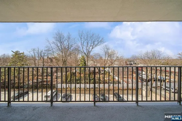 a view of a street from a balcony