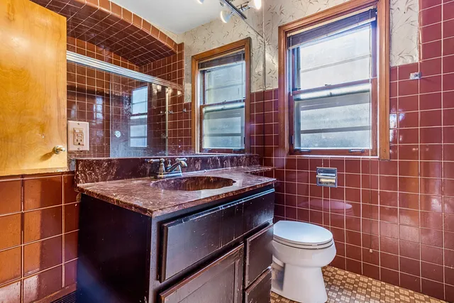 a bathroom with a sink and a toilet