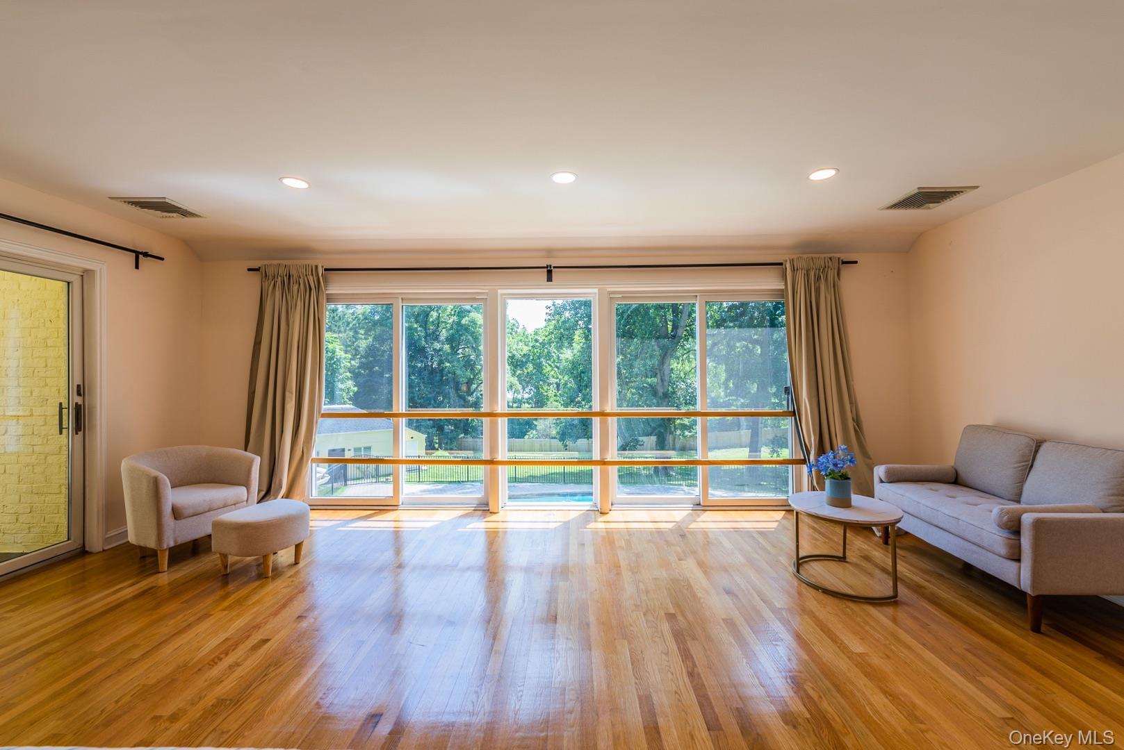 530 South Centre Island Road Centre Island, NY 11771 - Photo 18 of 32 Sitting room with light wood-style floors and recessed lighting