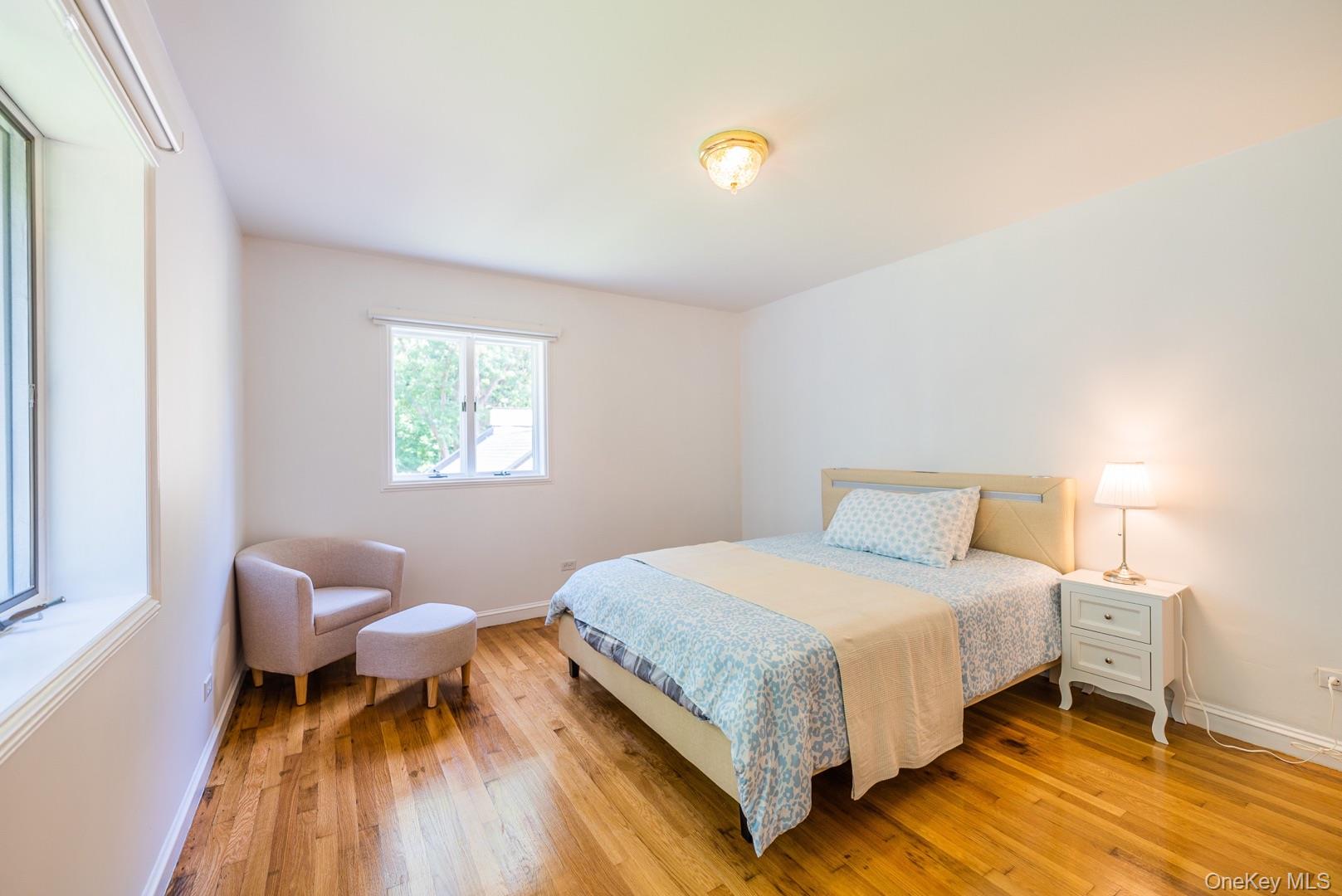 530 South Centre Island Road Centre Island, NY 11771 - Photo 27 of 32 Bedroom featuring light wood-style flooring