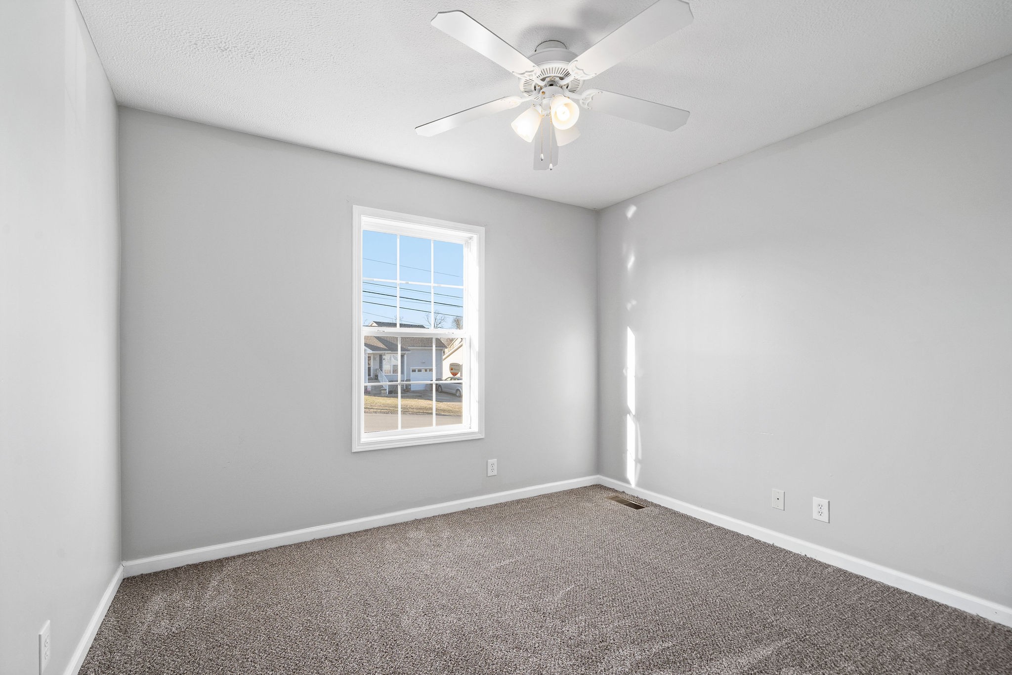 2904 Core Drive Clarksville, TN 37040 - Photo 13 of 23 an empty room with a window and a fan
