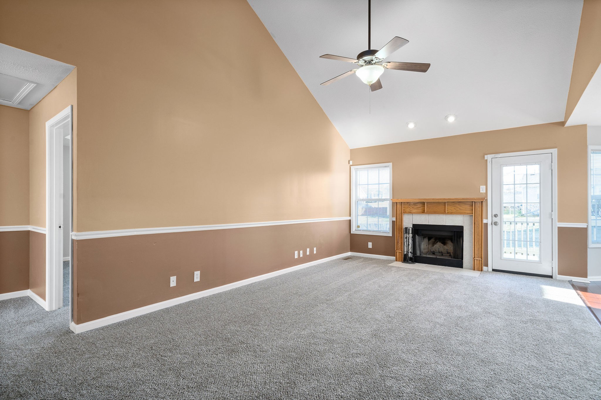 2904 Core Drive Clarksville, TN 37040 - Photo 5 of 23 an empty room with fireplace and fan
