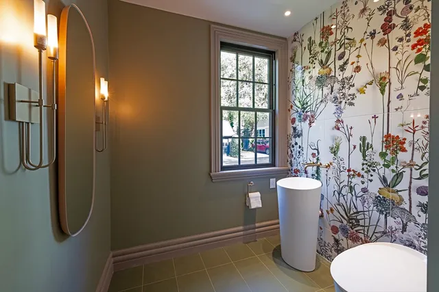 a view of a room with window and furniture