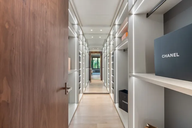 a bathroom with a shower and a sink