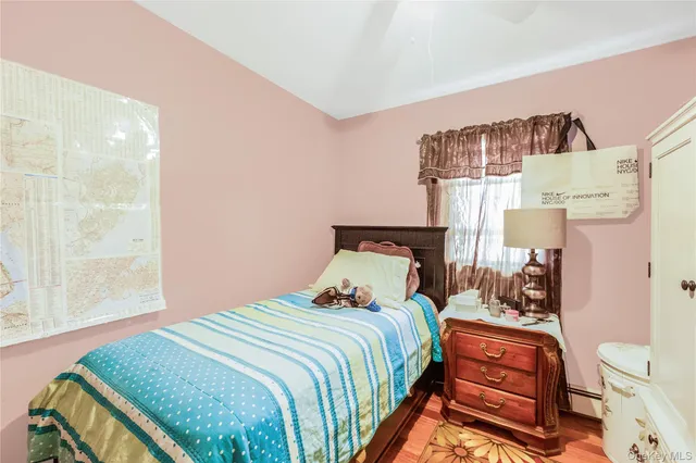 a view of a patio with table and chairs and potted plants