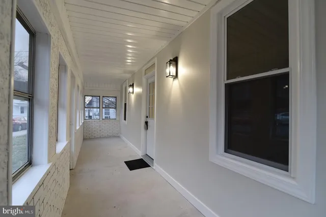 a view of gallery with windows