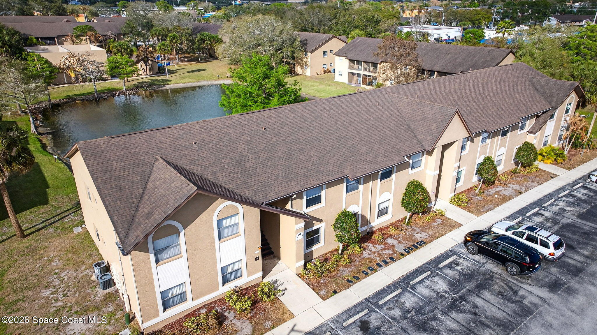 240 Spring Drive, Unit 5 Merritt Island, FL 32953 - Photo 3 of 45 DJI_20260304165819_0005_D