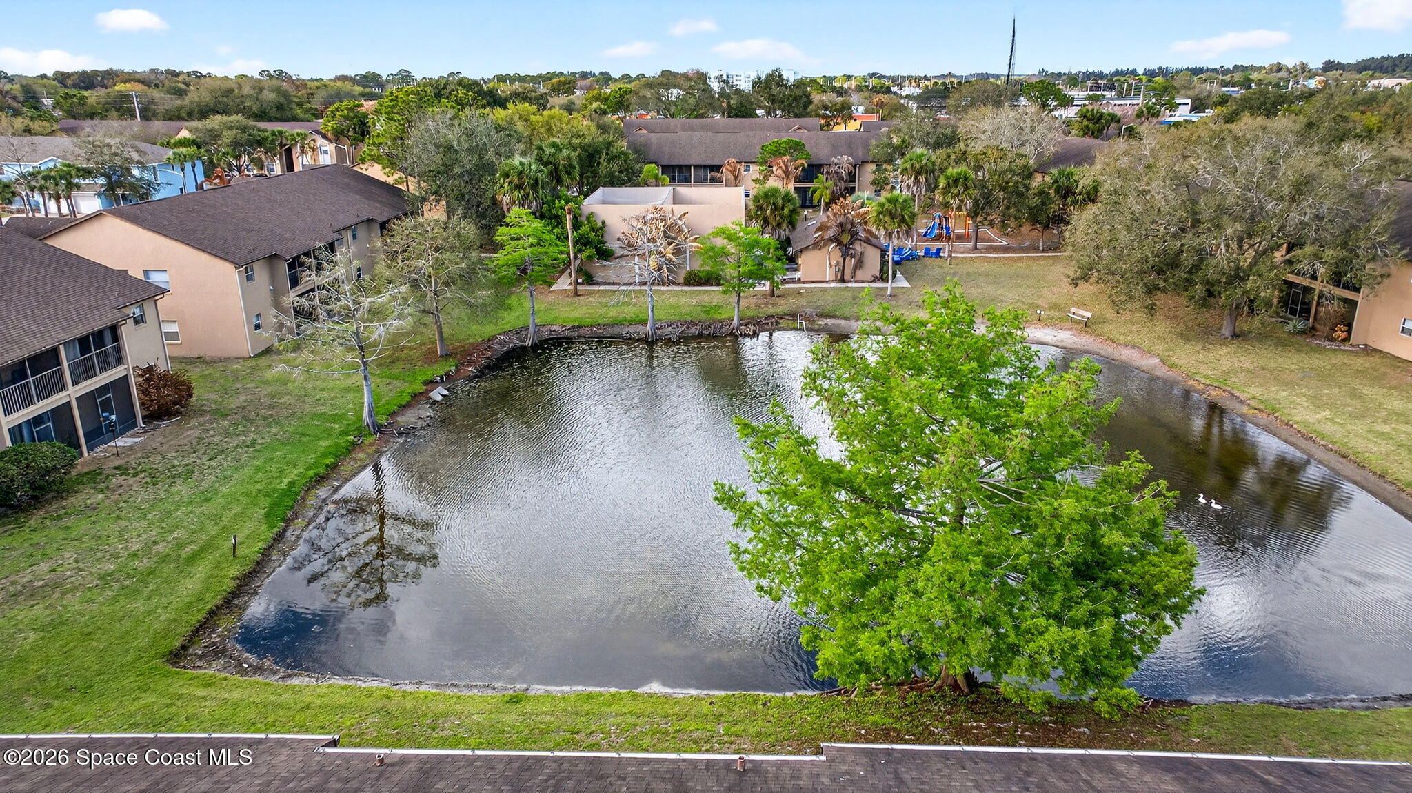 240 Spring Drive, Unit 5 Merritt Island, FL 32953 - Photo 9 of 45 DJI_20260304170126_0023_D