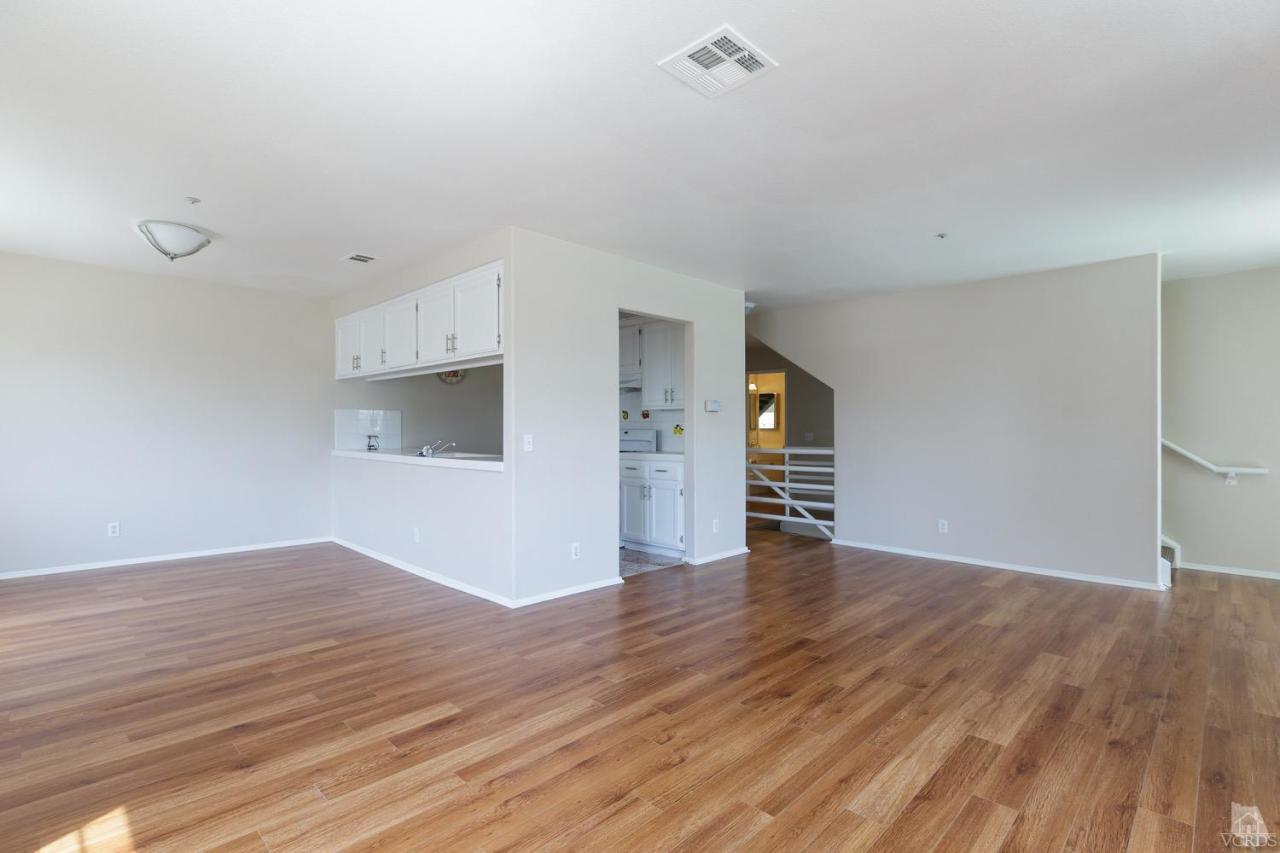 468 West Wooley Road Oxnard, CA 93030 - Photo 4 of 16 a view of an empty room with wooden floor