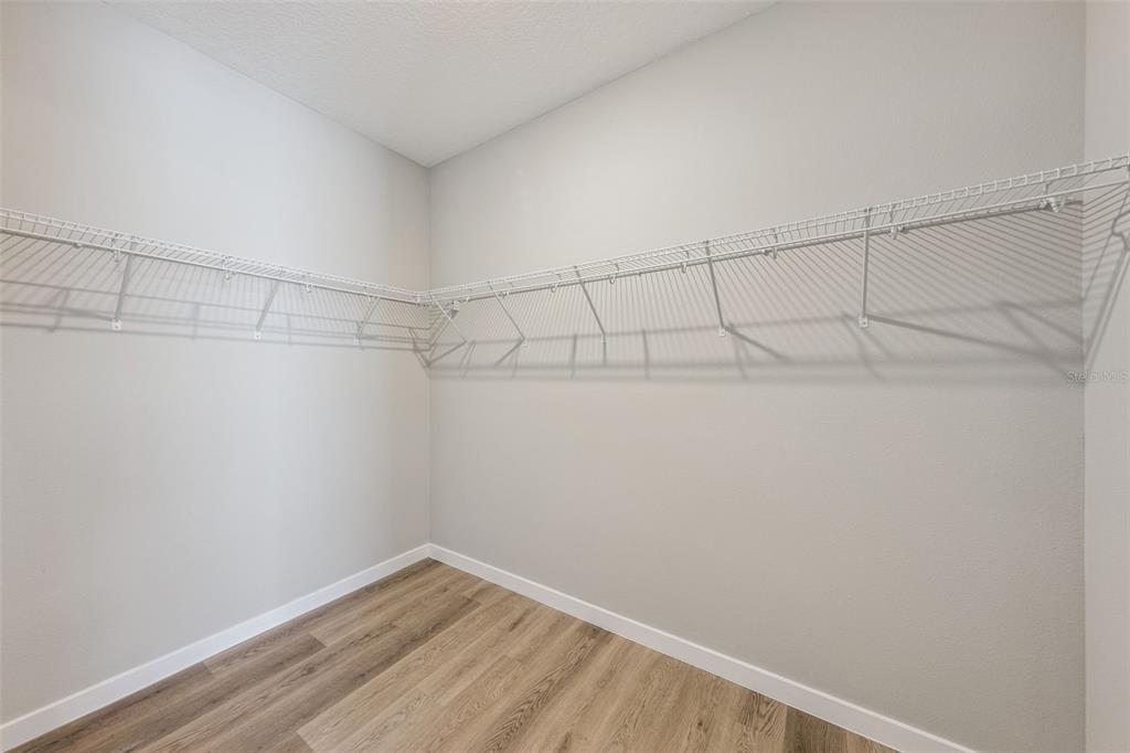 544 North Bumby Avenue, Unit 5 Orlando, FL 32803 - Photo 13 of 26 a view of a room with racks on the wall