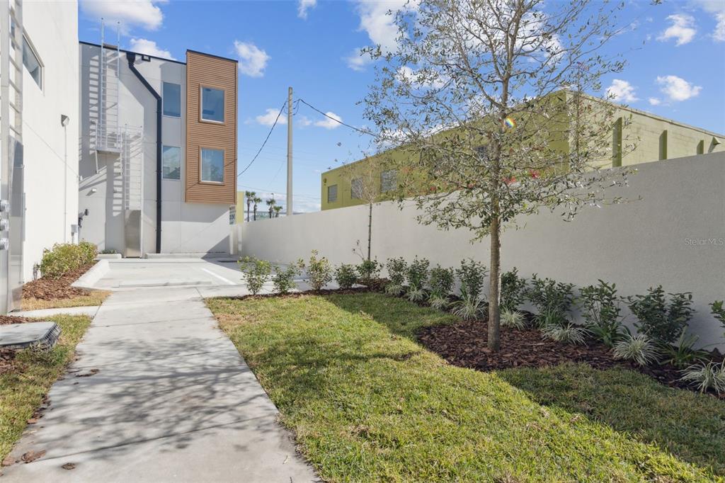 544 North Bumby Avenue, Unit 5 Orlando, FL 32803 - Photo 19 of 26 a front view of a house with garden