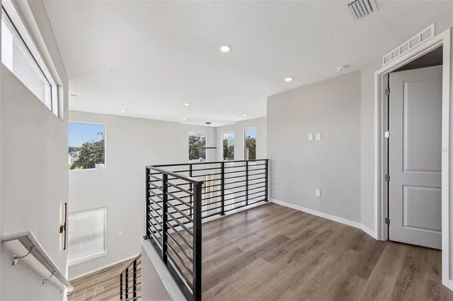 a view of entryway with wooden floor