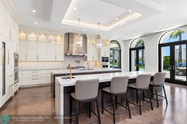 a living room with furniture and windows