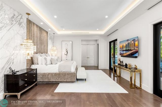 a view of a patio with swimming pool table and chairs