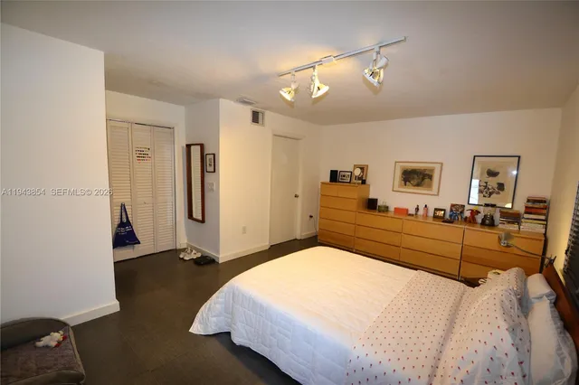 a bathroom with a sink and shower