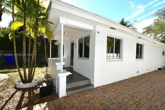 a front view of a house with patio