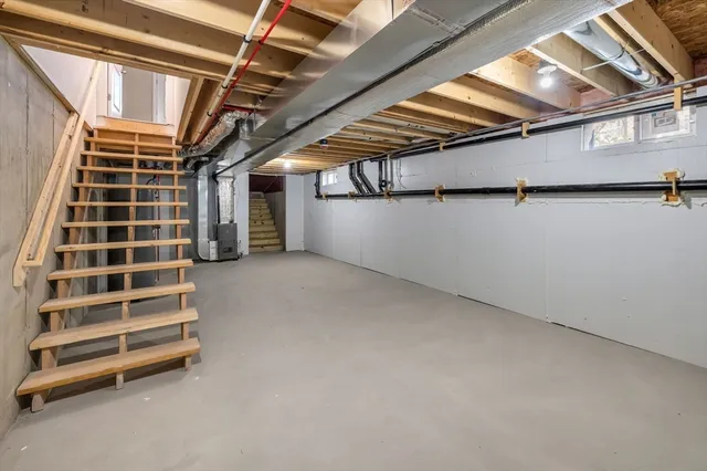 a view of an empty room with a windows