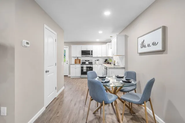 a view of a dining room with furniture